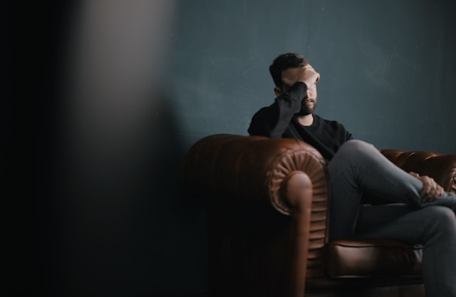 nik-shuliahin-BuNWp1bL0nc-unsplash man with anxiety
